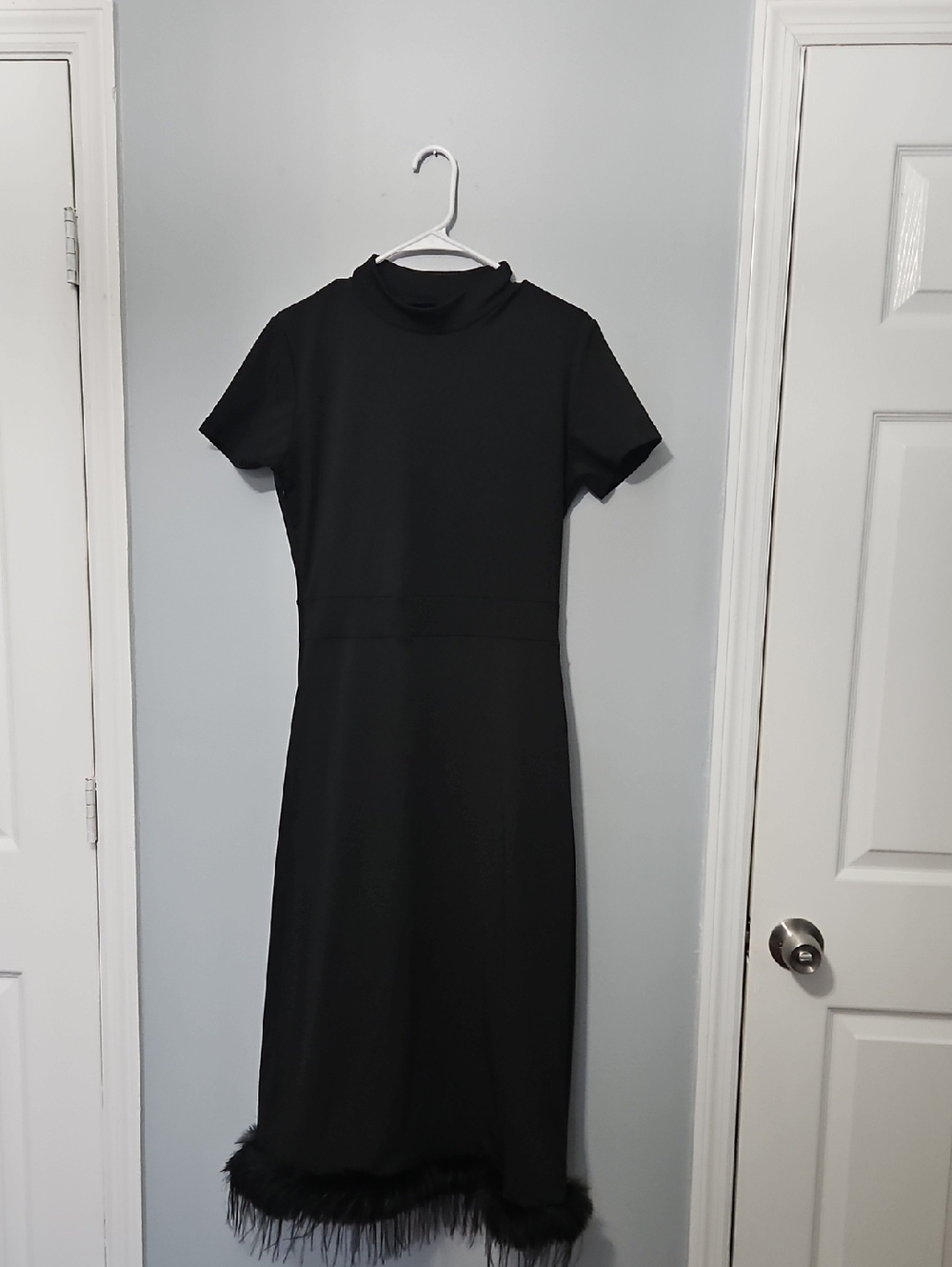 Classic Black Short-Sleeve Midi Dress with Feather Trim